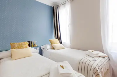 Cama o camas de una habitación en Casa Malasaña