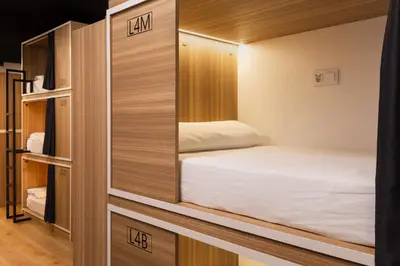 Cama o camas de una habitación en Hostal Siesta & Go Nuevos Ministerios