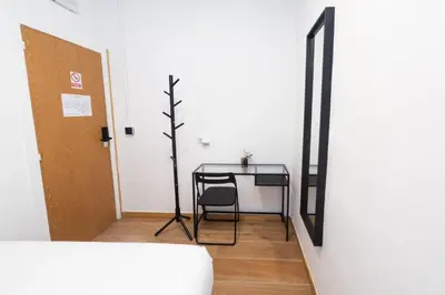 Cama o camas de una habitación en Hostal Siesta & Go Nuevos Ministerios