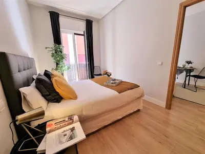 Cama o camas de una habitación en Plaza Ii De Mayo