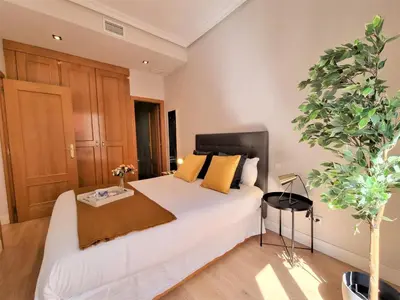 Cama o camas de una habitación en Plaza Ii De Mayo