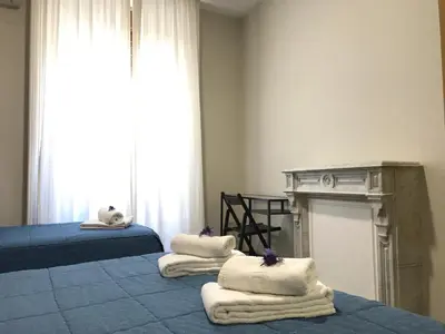 Cama o camas de una habitación en Hostal El Pilar