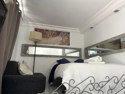 Cama o camas de una habitación en Una genial estancia en Madrid centro