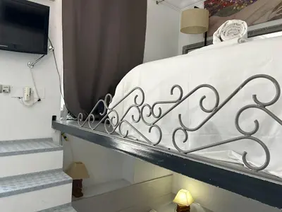 Cama o camas de una habitación en Una genial estancia en Madrid centro