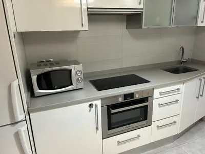 Una cocina o zona de cocina en Una genial estancia en Madrid centro