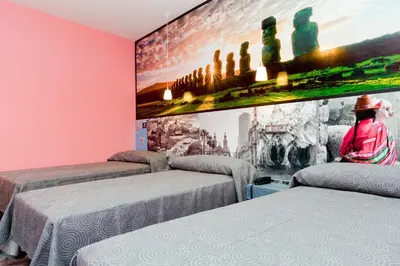 Cama o camas de una habitación en JC Rooms Chueca