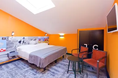 Cama o camas de una habitación en JC Rooms Chueca