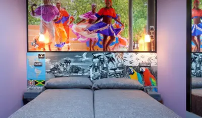 Cama o camas de una habitación en JC Rooms Chueca