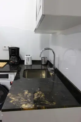 Una cocina o zona de cocina en Alma Suites