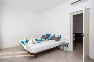 Cama o camas de una habitación en Alma Suites