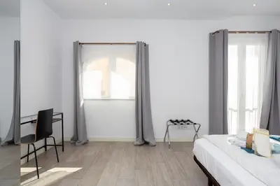 Cama o camas de una habitación en Alma Suites