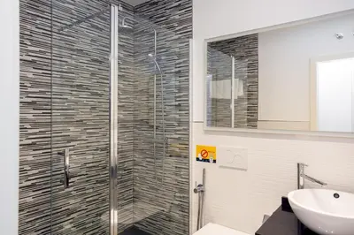 Un baño de Alma Suites