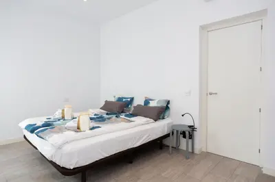 Cama o camas de una habitación en Alma Suites