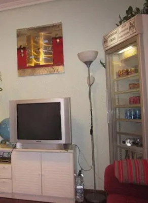 Una televisión o centro de entretenimiento en Hostal Esmeralda