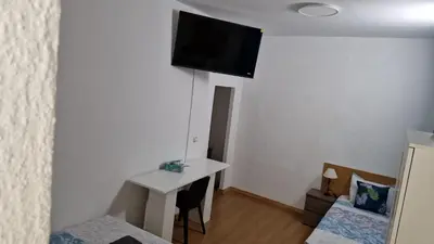 Una televisión o centro de entretenimiento en Estudio Grande Madrid Centro