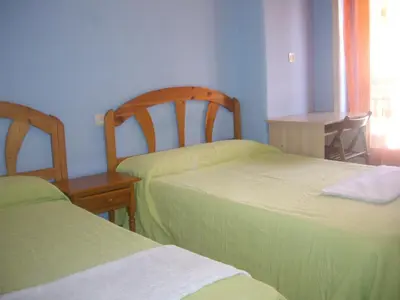 Cama o camas de una habitación en Hostal Pacios