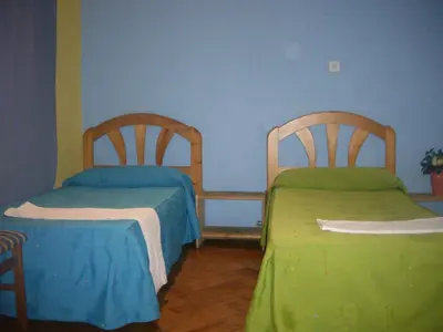 Cama o camas de una habitación en Hostal Pacios