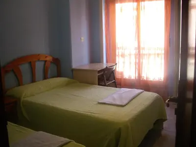 Cama o camas de una habitación en Hostal Pacios
