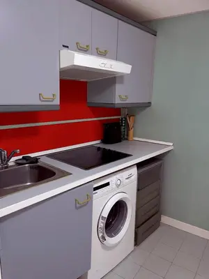 Una cocina o zona de cocina en SOL- CARLOS V Apartaments