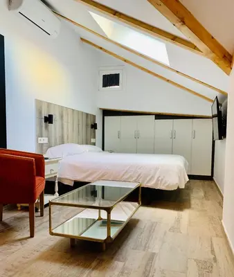 Cama o camas de una habitación en Hotel Madrid Río
