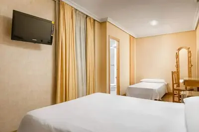 Cama o camas de una habitación en Hotel Madrid Río
