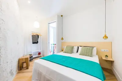 Cama o camas de una habitación en Be Mate Gran Vía Suites