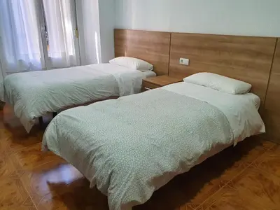 Cama o camas de una habitación en Hostal Zamorán -Madrid Centro Gran Vía Sol-