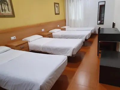 Cama o camas de una habitación en Hostal Zamorán -Madrid Centro Gran Vía Sol-