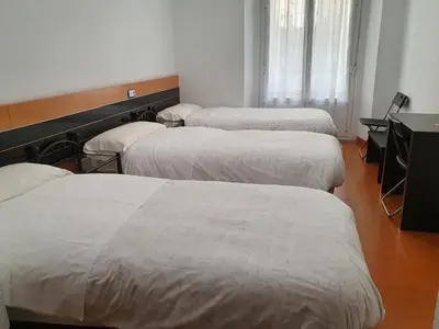 Cama o camas de una habitación en Hostal Zamorán -Madrid Centro Gran Vía Sol-