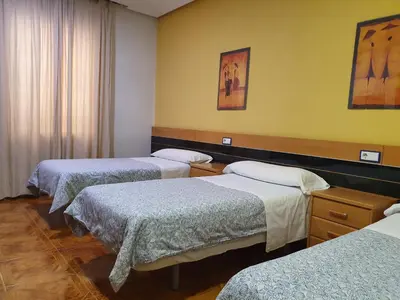 Cama o camas de una habitación en Hostal Zamorán -Madrid Centro Gran Vía Sol-