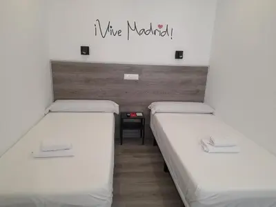 Cama o camas de una habitación en CH Bueno