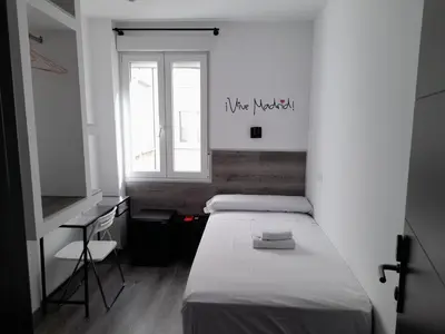 Cama o camas de una habitación en CH Bueno