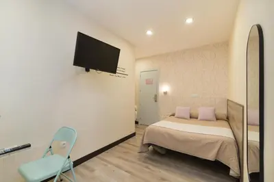 Cama o camas de una habitación en Hostal Art Madrid