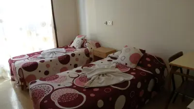 Cama o camas de una habitación en Hostal Huespedes Toledo