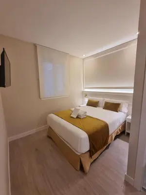Cama o camas de una habitación en CH Velarde