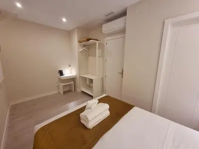 Cama o camas de una habitación en CH Velarde