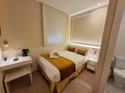Cama o camas de una habitación en CH Velarde