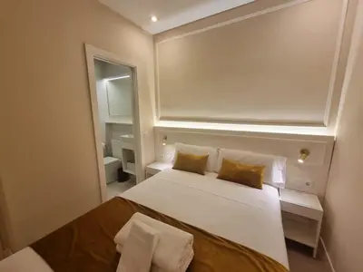 Cama o camas de una habitación en CH Velarde