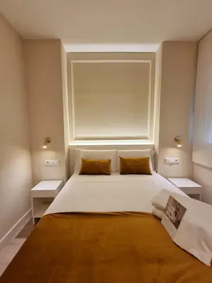 Cama o camas de una habitación en CH Velarde