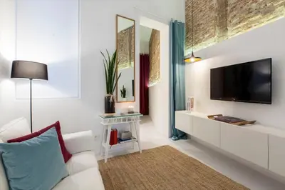 Una televisión o centro de entretenimiento en Madrid to heaven Apartment