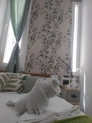 Cama o camas de una habitación en Habitaciones Universal