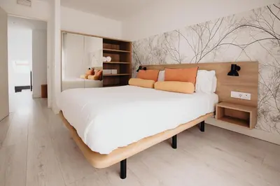 Cama o camas de una habitación en Aspasios Atocha Apartments