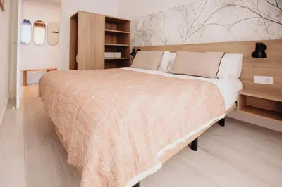 Cama o camas de una habitación en Aspasios Atocha Apartments