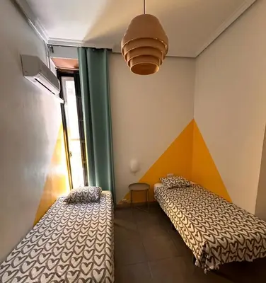 Cama o camas de una habitación en Barbieri Sol Hostel