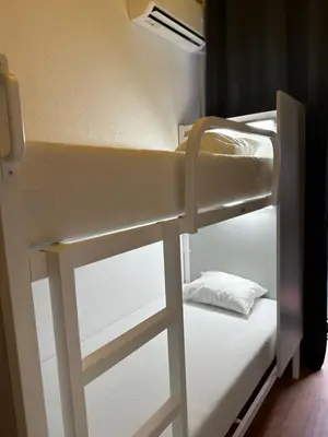 Cama o camas de una habitación en Barbieri Sol Hostel