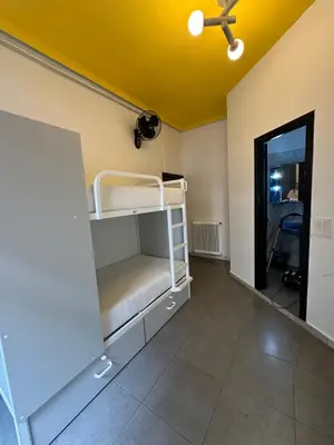 Cama o camas de una habitación en Barbieri Sol Hostel