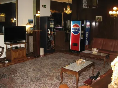 Una televisión o centro de entretenimiento en Hostal Maria Cristina
