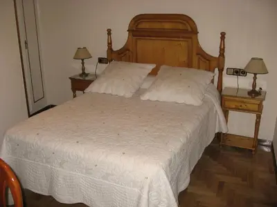 Cama o camas de una habitación en Hostal Maria Cristina