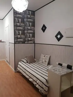 Cama o camas de una habitación en Apartamentos Sol Mayor
