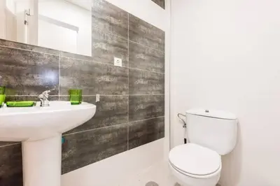 Un baño de M&F Apartaments Gran Via